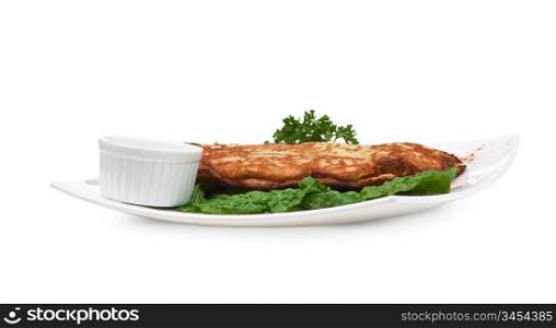 dish of pancakes with vegetables isolated on a white background