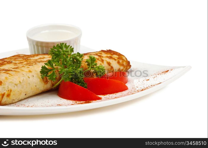 dish of pancakes with vegetables isolated on a white background