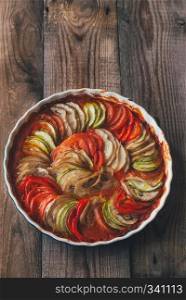 Dish of ratatouille on the wooden table