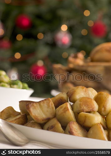 Dish of Roast Potatoes Roast Turkey and Brussel Sprouts