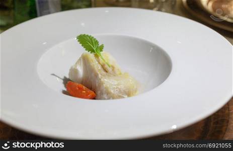 dish of salt cod in low-temperature frying