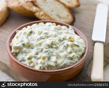 Dish of Sauce Gribiche with Toasted Baguette