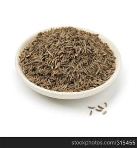 Dish with dried organic Caraway seeds isolated on white background