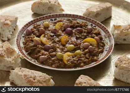 Dish with traditional moroccan kercha and bread for Eid al-Adha