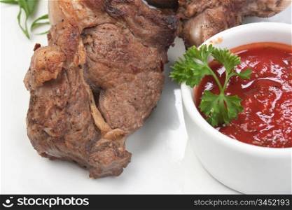dishes of roast meat and spices