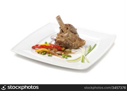 dishes of roast meat with vegetables and spices isolated on white background