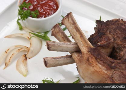 dishes of roast meat with vegetables and spices isolated on white background