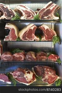 Display Of Dry Aged Meat In Butchers Shop