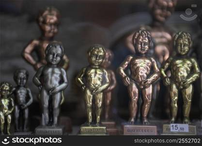 Display Of Mannekin Pis Statues In Brussels Shop