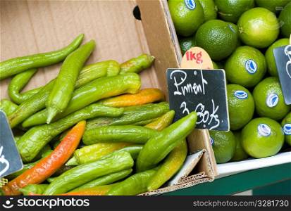 Display of peppers and limes in Paris France