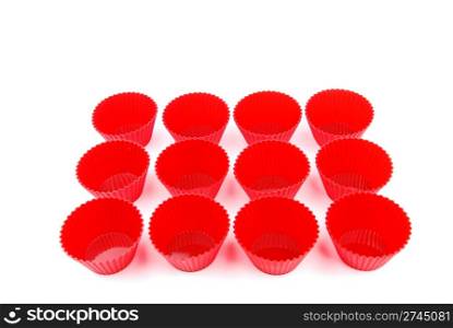 display of red plastic cups isolated on white background