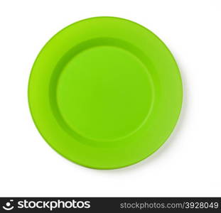Disposable green plate isolated on a white background.