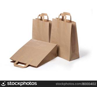 disposable paper bags isolated on white.