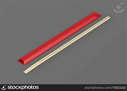 Disposable wooden chopsticks on gray background