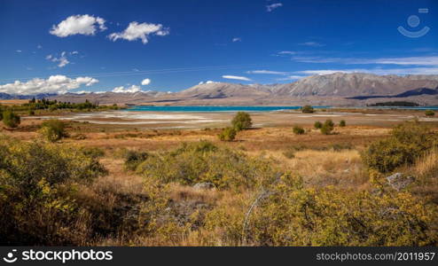 Distant View of Lake Tekapo on a Summer&rsquo;s Day