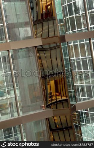 Distorted reflection of office building.