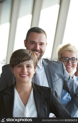 diverse business people group standing together as team in modern bright office interior