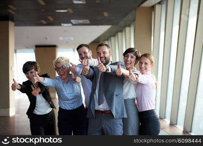 diverse business people group standing together as team in modern bright office interior