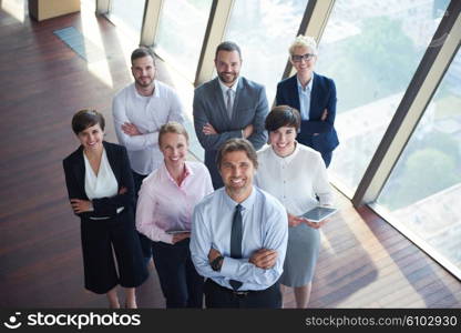 diverse business people group standing together as team in modern bright office interior