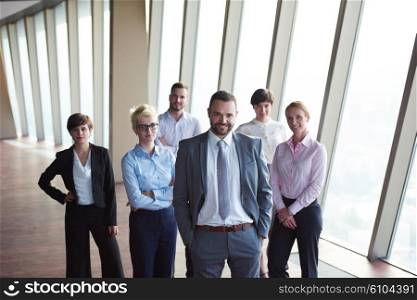 diverse business people group standing together as team in modern bright office interior