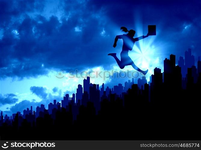 Diversity at work. Silhouette of businesswoman jumping above city against sunset background