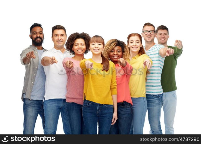 diversity, choice, ethnicity and people concept - international group of happy smiling men and women pointing finger on you over white