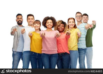 diversity, choice, ethnicity and people concept - international group of happy smiling men and women pointing finger on you over white