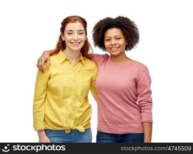 diversity, international, ethnicity, friendship and people concept - happy smiling women hugging over white