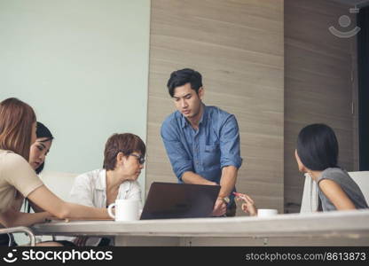 Diversity multiethnic team group of business people Present meeting conference room brainstorming business graph, chart. Multicultural Teamwork collaborate business team meeting together trust partner