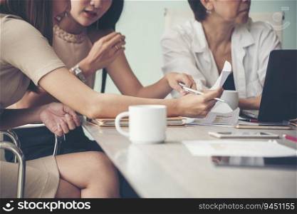 Diversity multiethnic team group of business people Present meeting conference room brainstorming business graph, chart. Multicultural Teamwork collaborate business team meeting together trust partner