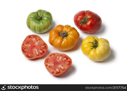 Diversity of Beefsteak Tomatoes on white background