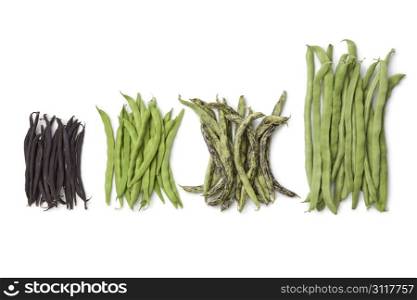 Diversity of fresh beans on white background