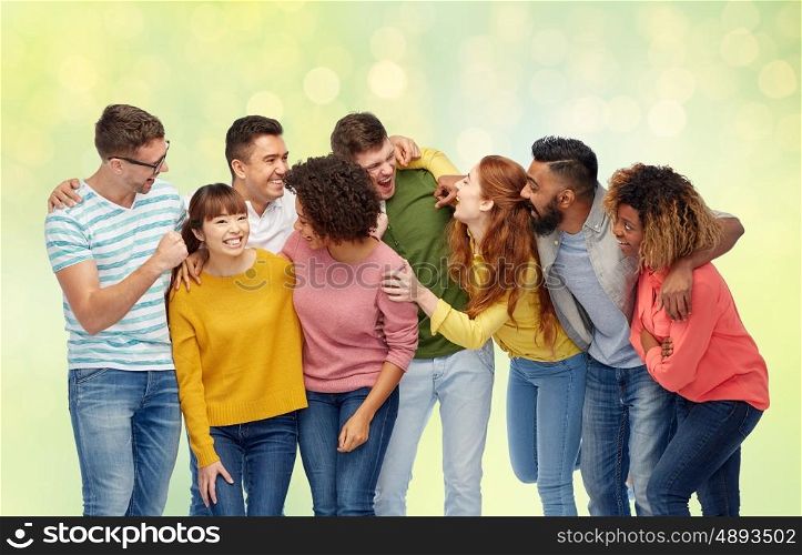 diversity, race, ethnicity and people concept - international group of happy men and women laughing over summer green lights background
