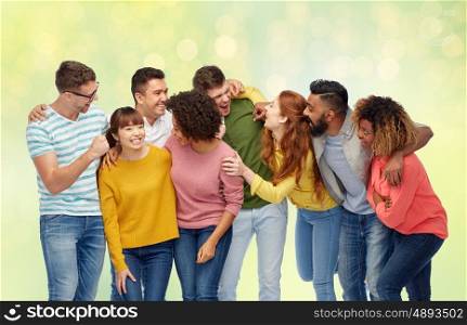 diversity, race, ethnicity and people concept - international group of happy men and women laughing over summer green lights background