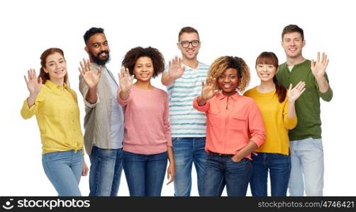 diversity, race, ethnicity and people concept - international group of happy smiling men and women waving hand over white