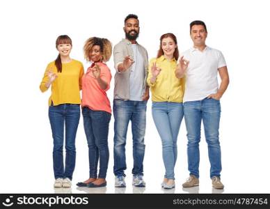 diversity, race, ethnicity and people concept - international group of happy smiling men and women showing ok hand sign over white