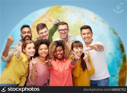 diversity, race, ethnicity and people concept - international group of happy smiling men and women showing thumbs up and peace over white