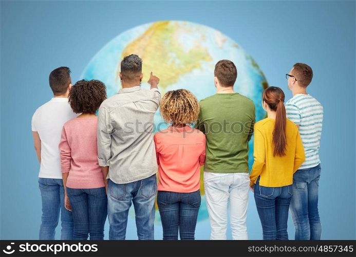 diversity, race, ethnicity and people concept - international group of happy smiling men and women pointing finger to something over white