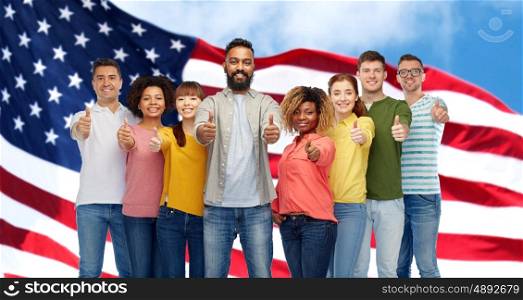 diversity, race, ethnicity and people concept - international group of happy smiling men and women showing thumbs up over american flag background