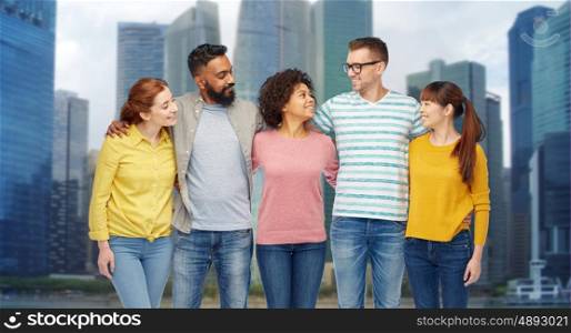 diversity, race, ethnicity and people concept - international group of happy smiling men and women over singapore city skyscrapers background