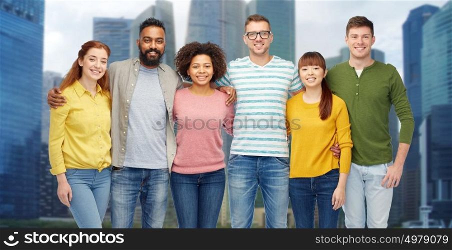 diversity, race, ethnicity and people concept - international group of happy smiling men and women over singapore city skyscrapers background. international group of happy smiling people