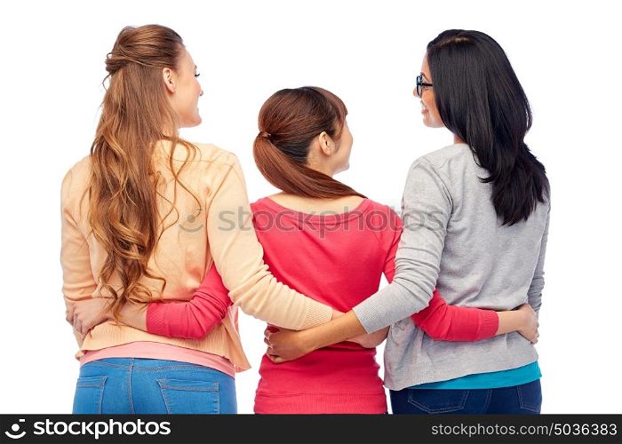 diversity, race, ethnicity and people concept - international group of happy smiling different women hugging over white from back. international group of happy women from back