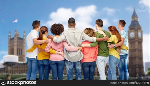 diversity, race, ethnicity and people concept - international group of men and women hugging over london city background