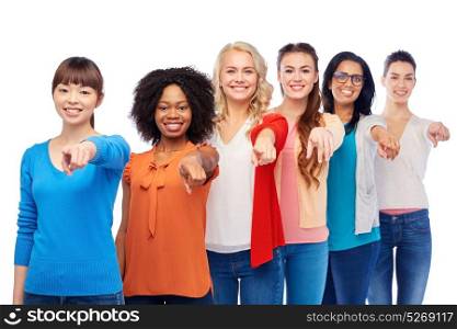 diversity, race, ethnicity, choice and people concept - international group of happy smiling different women over white pointing finger at you. international group of happy smiling women