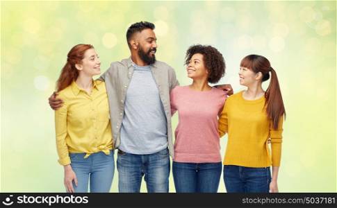 diversity, race, ethnicity, friendship and people concept - international group of happy smiling men and women over green lights background. international group of happy smiling people