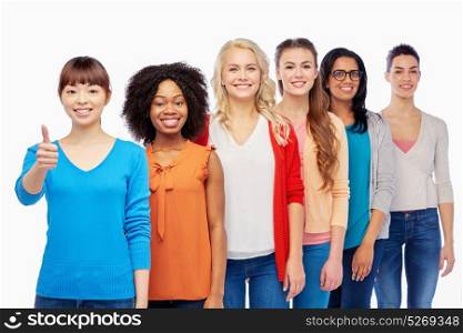 diversity, race, ethnicity, gesture and people concept - international group of happy smiling different women over white showing thumbs up. international group of women showing thumbs up
