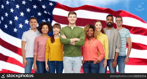 diversity, race, ethnicity, immigration and people concept - international group of happy smiling men and women over american flag background. happy international people over american flag
