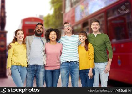 diversity, travel, tourism and people concept - international group of happy smiling men and women over london street and city bus background