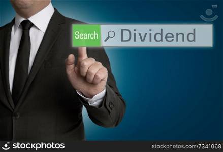 Dividend browser is operated by businessman concept.. Dividend browser is operated by businessman concept