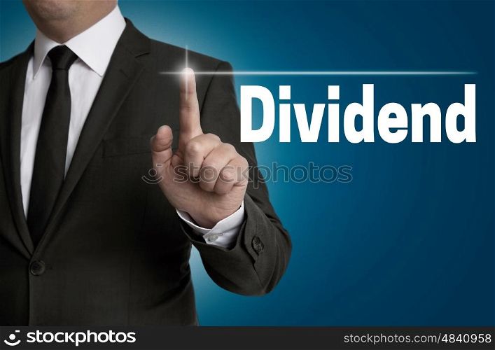 dividend touchscreen is operated by businessman concept
